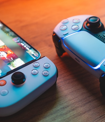 A vibrant gaming-themed illustration showing diverse players enjoying mobile games on their devices.